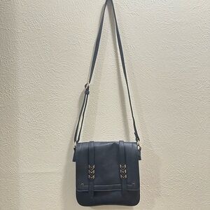 Amazon purse, black with arrow design on front.